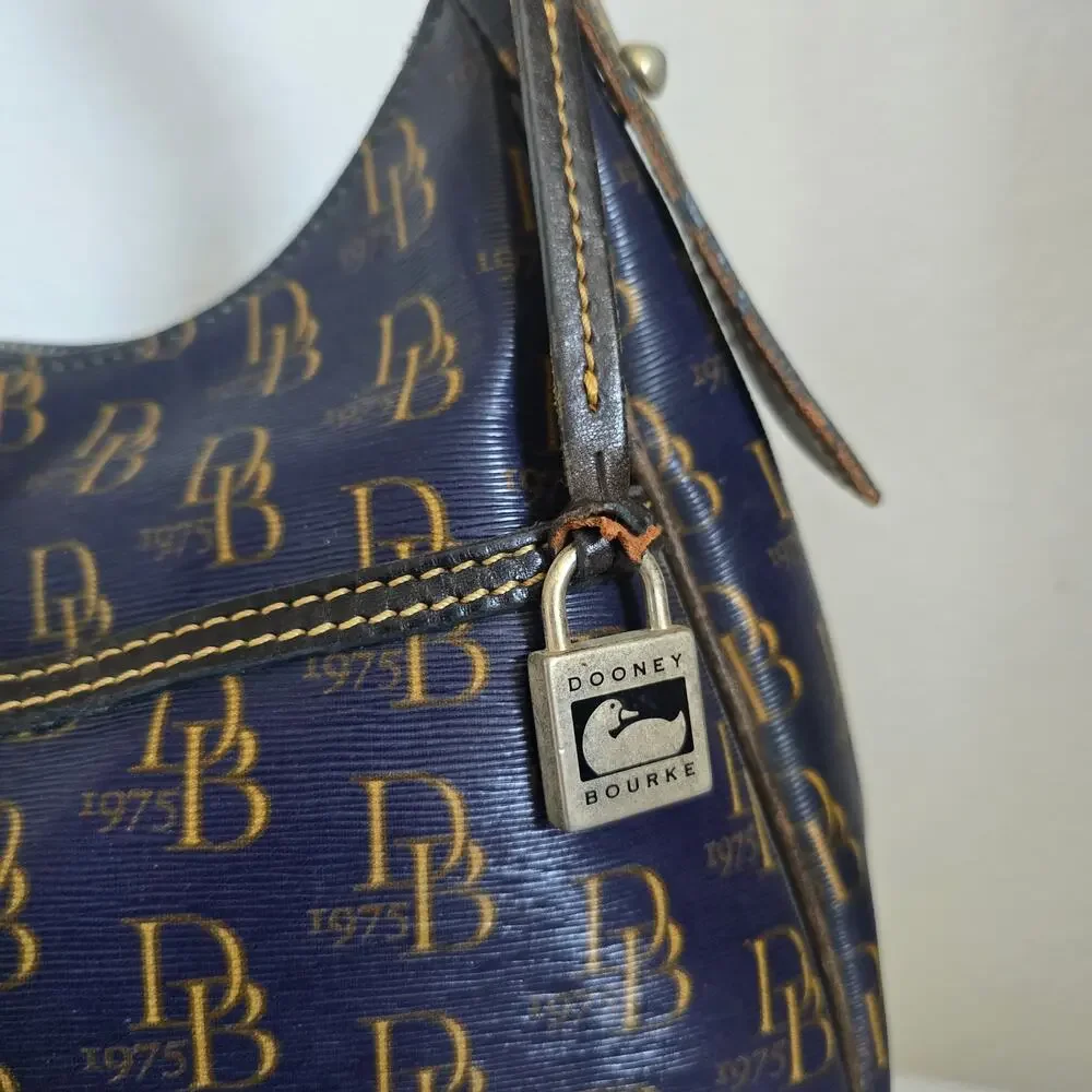 Dooney and Bourke 1975 Signature Collins Navy Shoulder Bag Coated Canvas Leather